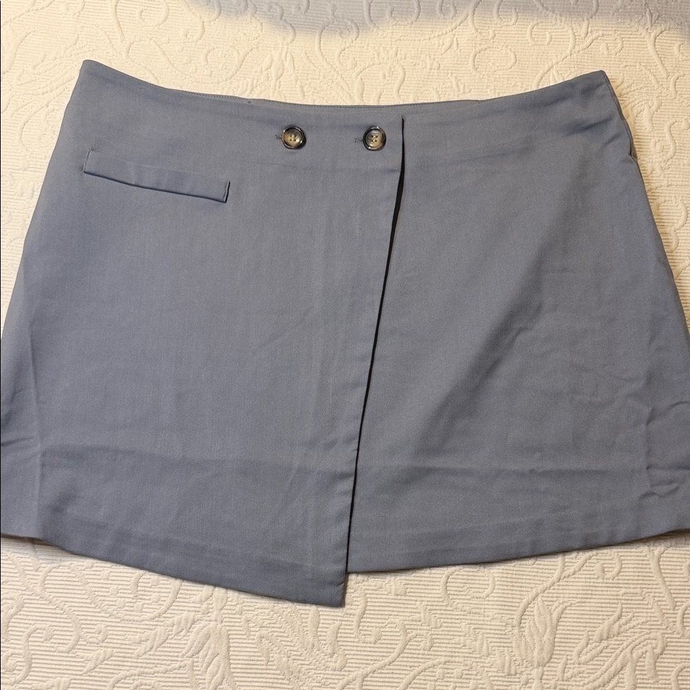 H&M pigeon blue wrapover mini skirt. NWT 14